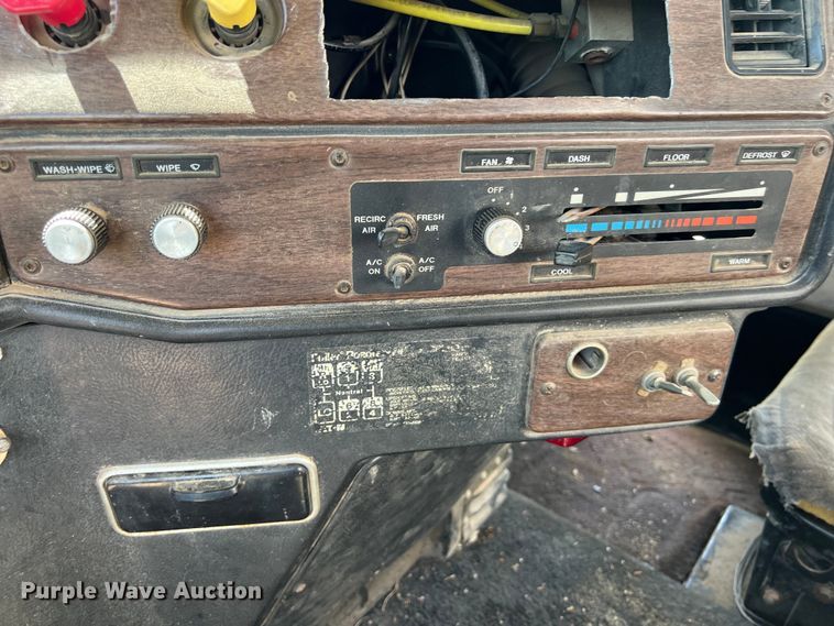 image for item DS2934 1989 Freightliner FLC flatbed truck with Vermeer fluid mixer