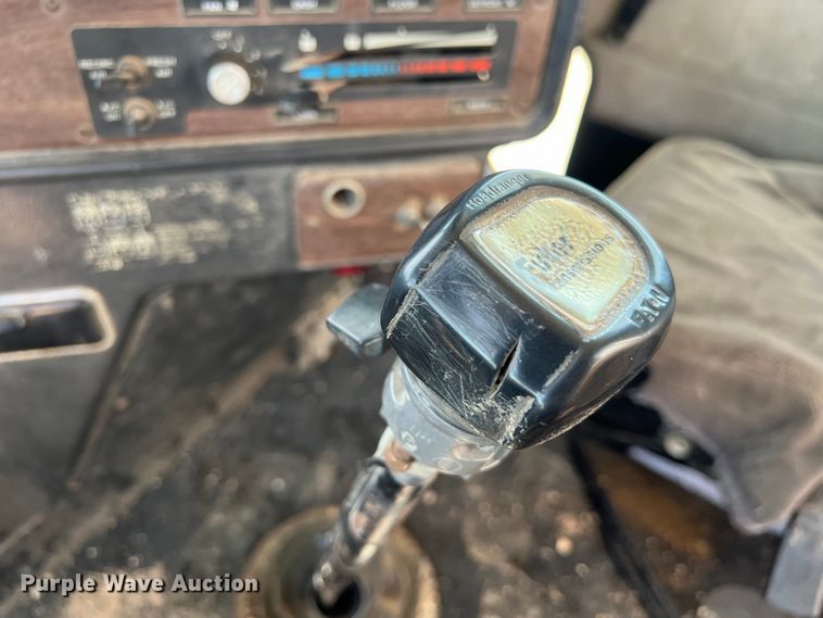 image for item DS2934 1989 Freightliner FLC flatbed truck with Vermeer fluid mixer