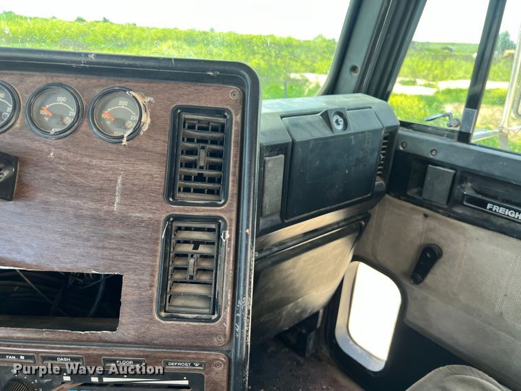 image for item DS2934 1989 Freightliner FLC flatbed truck with Vermeer fluid mixer