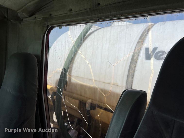 image for item DS2934 1989 Freightliner FLC flatbed truck with Vermeer fluid mixer