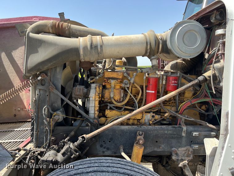 image for item DS2934 1989 Freightliner FLC flatbed truck with Vermeer fluid mixer