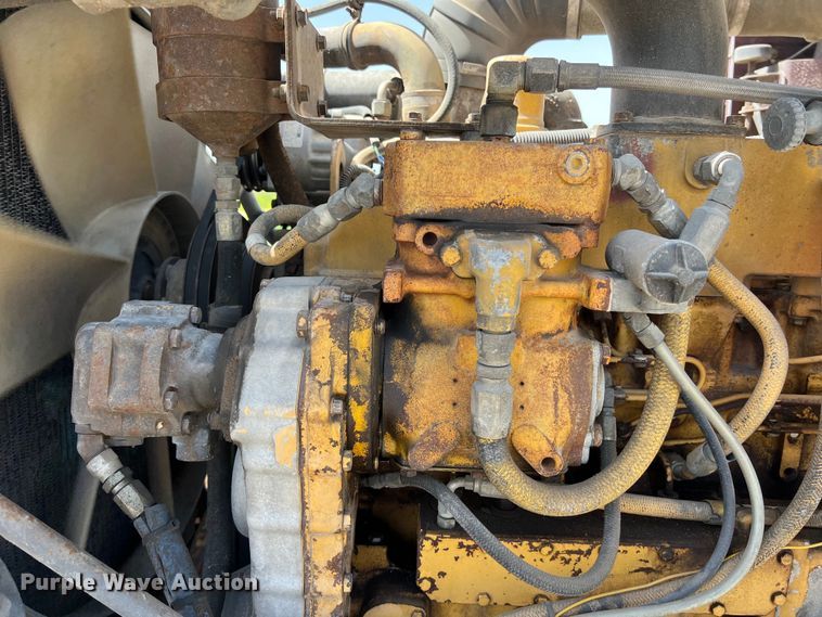 image for item DS2934 1989 Freightliner FLC flatbed truck with Vermeer fluid mixer