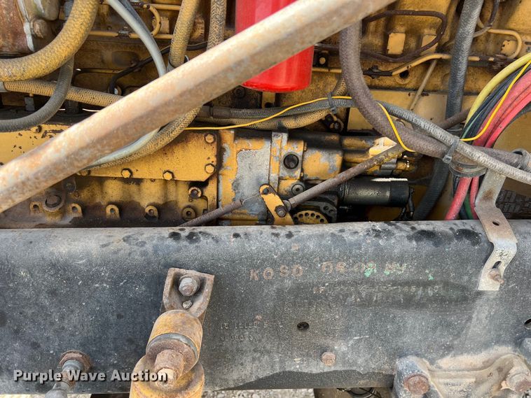 image for item DS2934 1989 Freightliner FLC flatbed truck with Vermeer fluid mixer