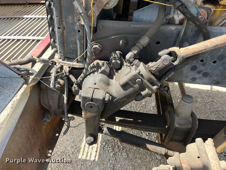 image for item DS2934 1989 Freightliner FLC flatbed truck with Vermeer fluid mixer