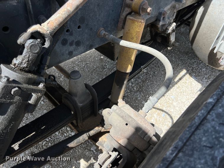 image for item DS2934 1989 Freightliner FLC flatbed truck with Vermeer fluid mixer