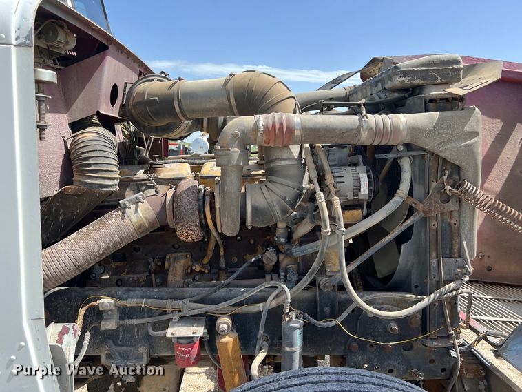 image for item DS2934 1989 Freightliner FLC flatbed truck with Vermeer fluid mixer