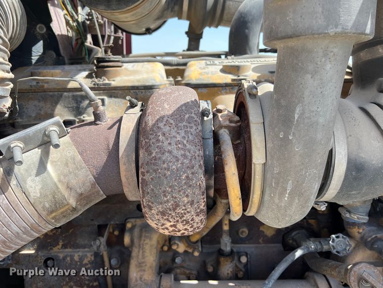 image for item DS2934 1989 Freightliner FLC flatbed truck with Vermeer fluid mixer