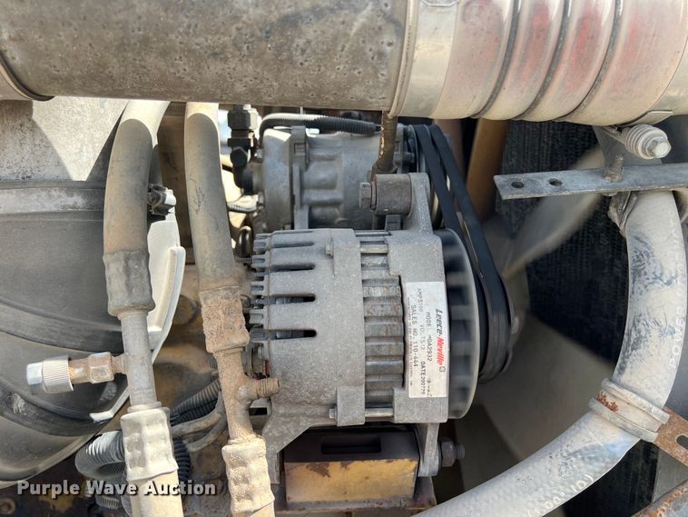 image for item DS2934 1989 Freightliner FLC flatbed truck with Vermeer fluid mixer