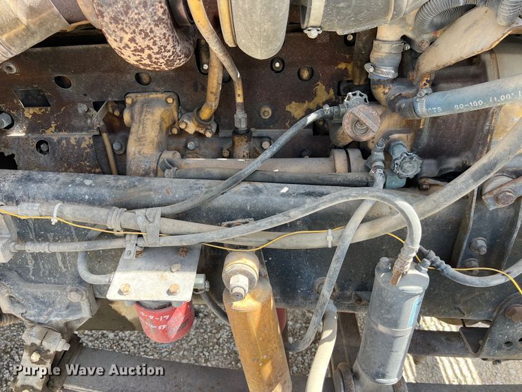 image for item DS2934 1989 Freightliner FLC flatbed truck with Vermeer fluid mixer