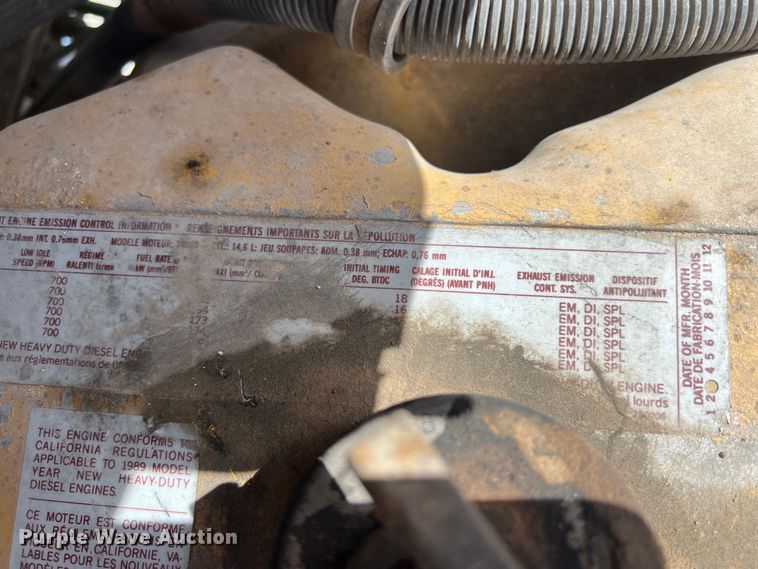 image for item DS2934 1989 Freightliner FLC flatbed truck with Vermeer fluid mixer