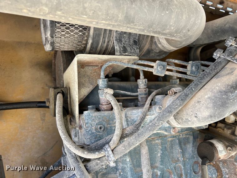 image for item DS2934 1989 Freightliner FLC flatbed truck with Vermeer fluid mixer