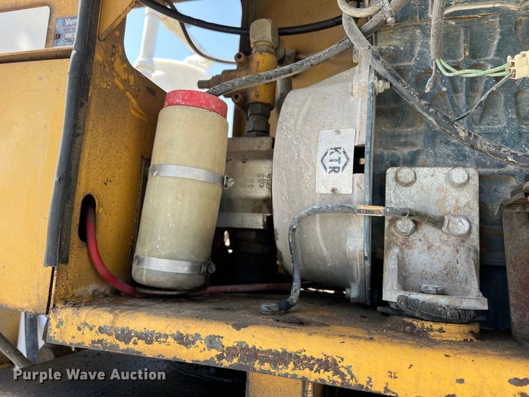 image for item DS2934 1989 Freightliner FLC flatbed truck with Vermeer fluid mixer