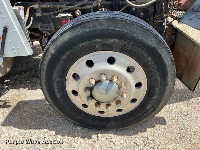 image for item DS2934 1989 Freightliner FLC flatbed truck with Vermeer fluid mixer