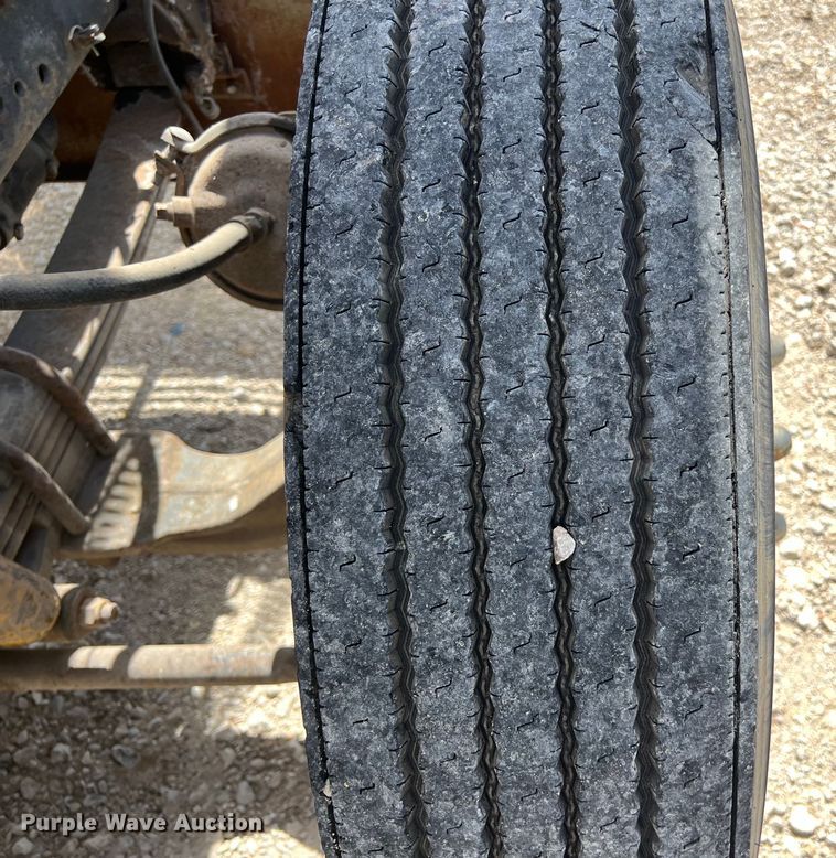 image for item DS2934 1989 Freightliner FLC flatbed truck with Vermeer fluid mixer