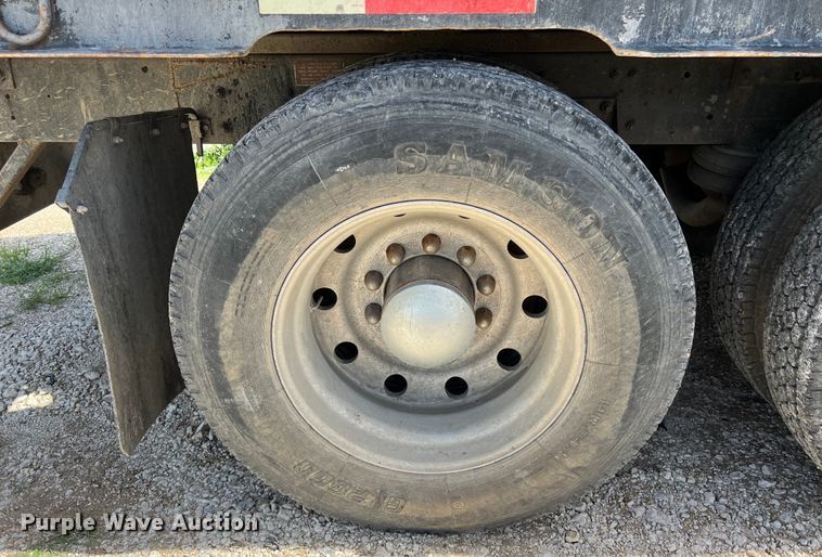 image for item DS2934 1989 Freightliner FLC flatbed truck with Vermeer fluid mixer