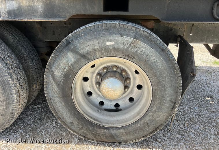 image for item DS2934 1989 Freightliner FLC flatbed truck with Vermeer fluid mixer