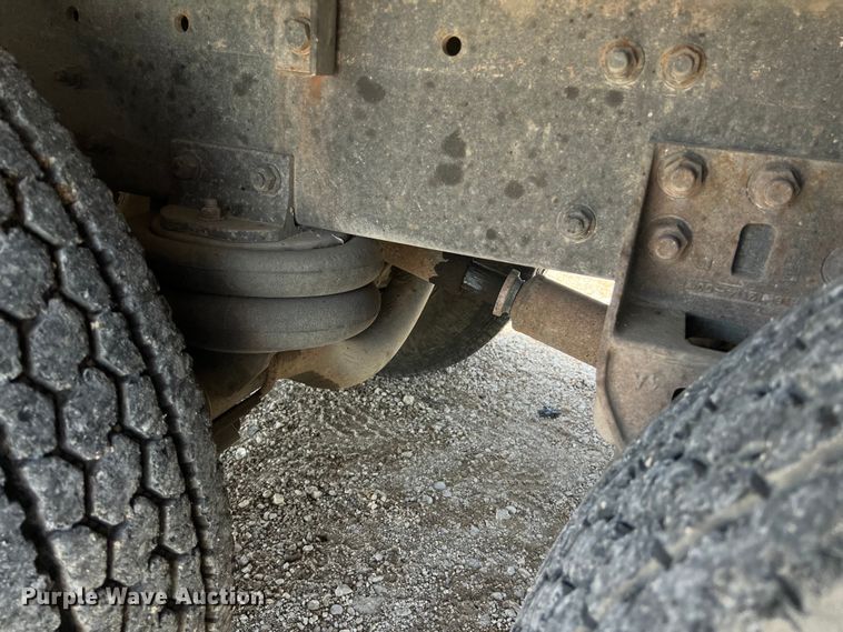 image for item DS2934 1989 Freightliner FLC flatbed truck with Vermeer fluid mixer