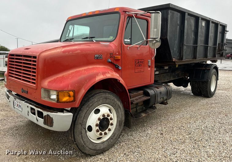 image for item EH6641 1999 International 4900 roll-off container truck