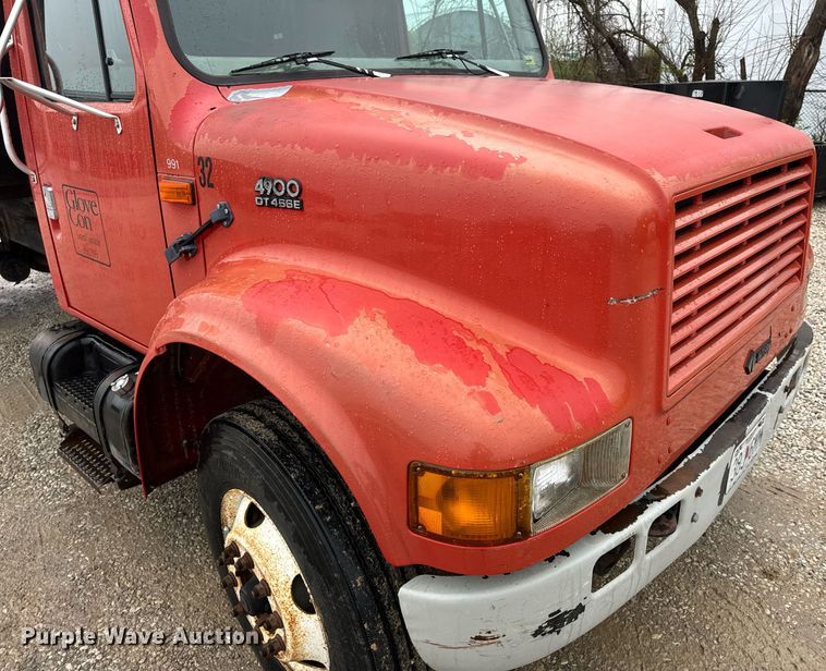 image for item EH6641 1999 International 4900 roll-off container truck