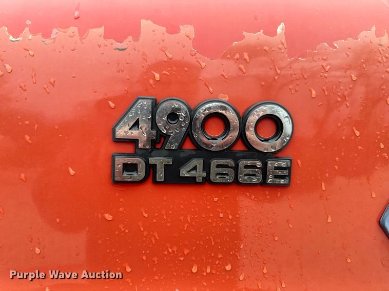 image for item EH6641 1999 International 4900 roll-off container truck