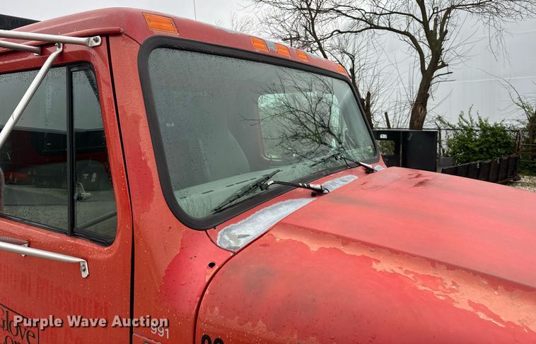 image for item EH6641 1999 International 4900 roll-off container truck