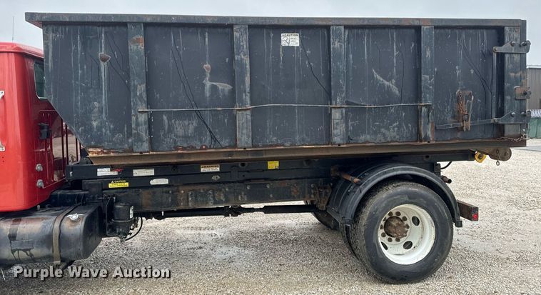 image for item EH6641 1999 International 4900 roll-off container truck