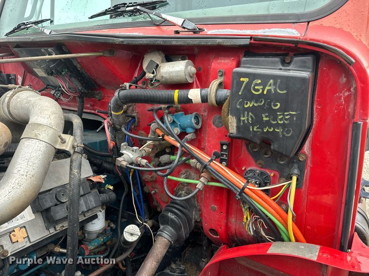 image for item EH6641 1999 International 4900 roll-off container truck