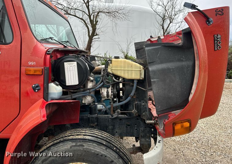 image for item EH6641 1999 International 4900 roll-off container truck