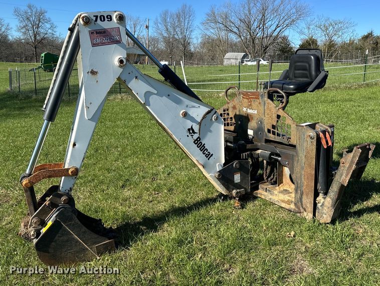 image for item EH6649 Bobcat 709FDS skid steer backhoe