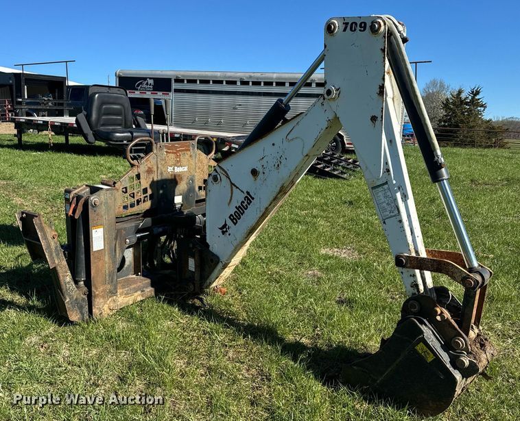 image for item EH6649 Bobcat 709FDS skid steer backhoe