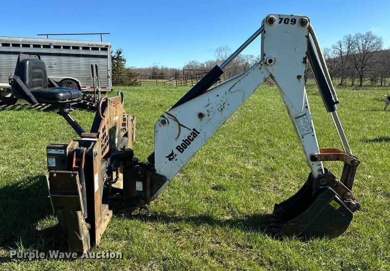 image for item EH6649 Bobcat 709FDS skid steer backhoe