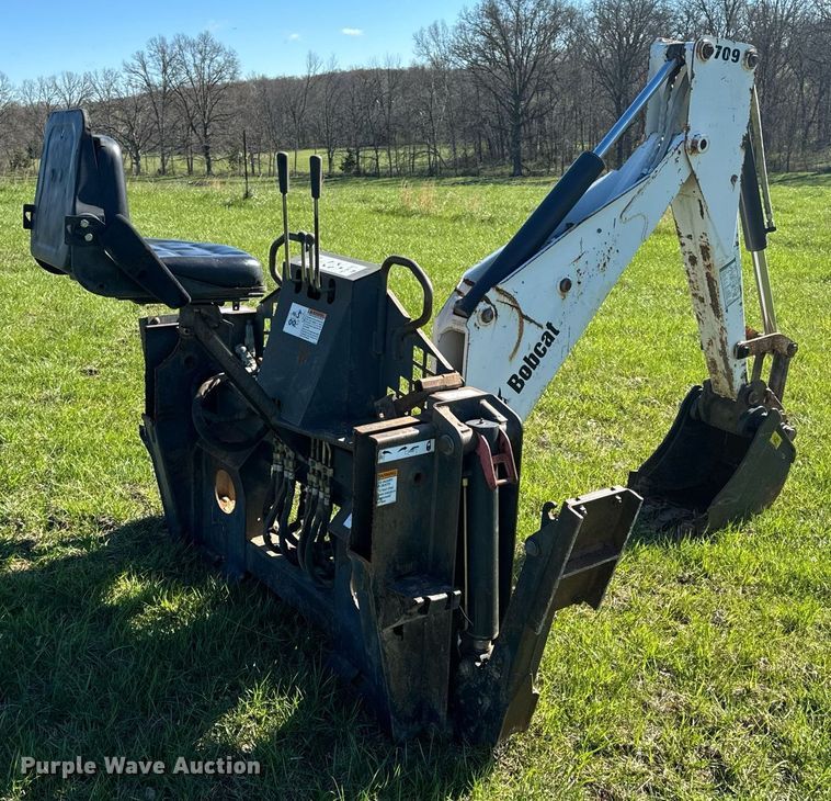 image for item EH6649 Bobcat 709FDS skid steer backhoe