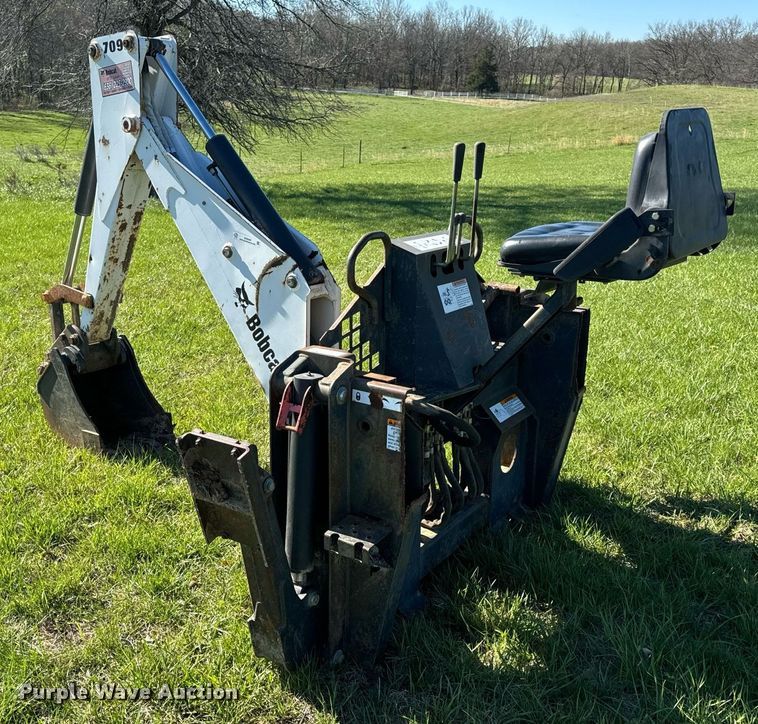 image for item EH6649 Bobcat 709FDS skid steer backhoe