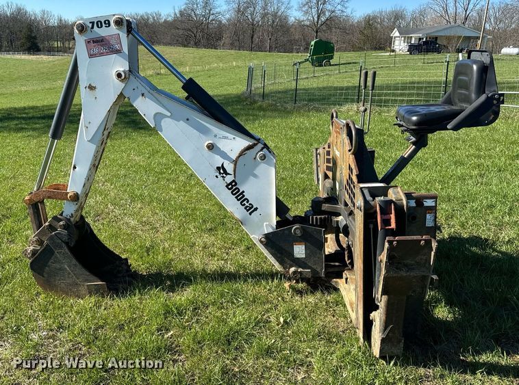 image for item EH6649 Bobcat 709FDS skid steer backhoe