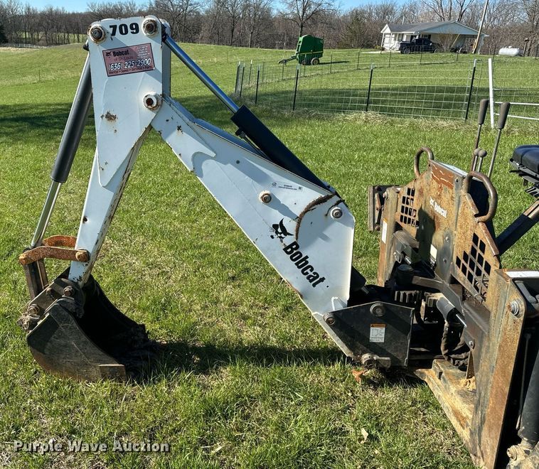 image for item EH6649 Bobcat 709FDS skid steer backhoe