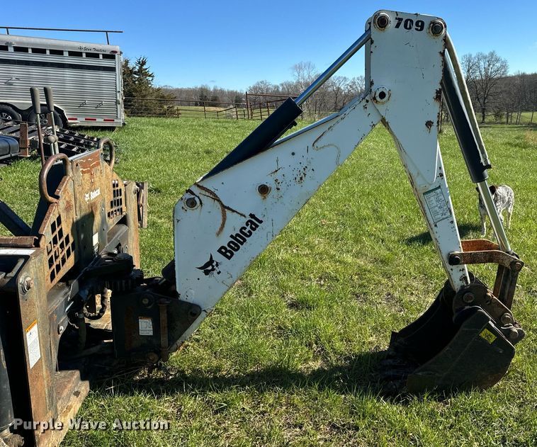 image for item EH6649 Bobcat 709FDS skid steer backhoe