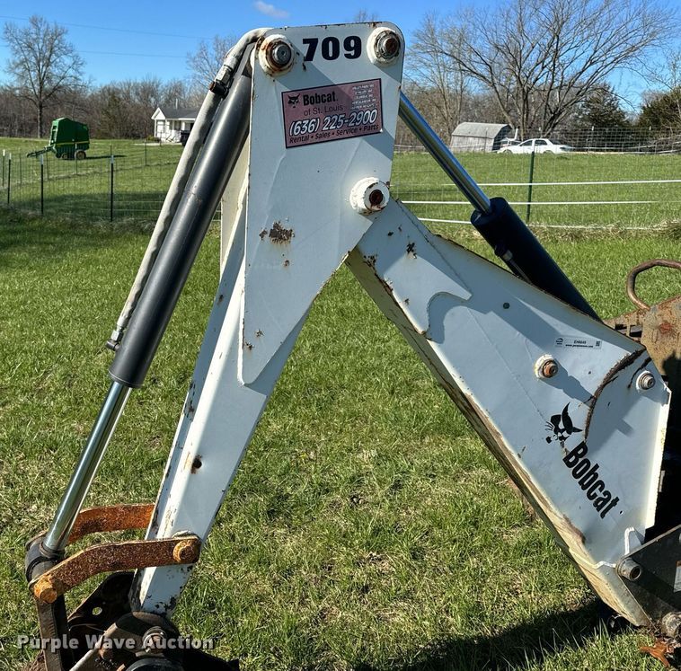 image for item EH6649 Bobcat 709FDS skid steer backhoe