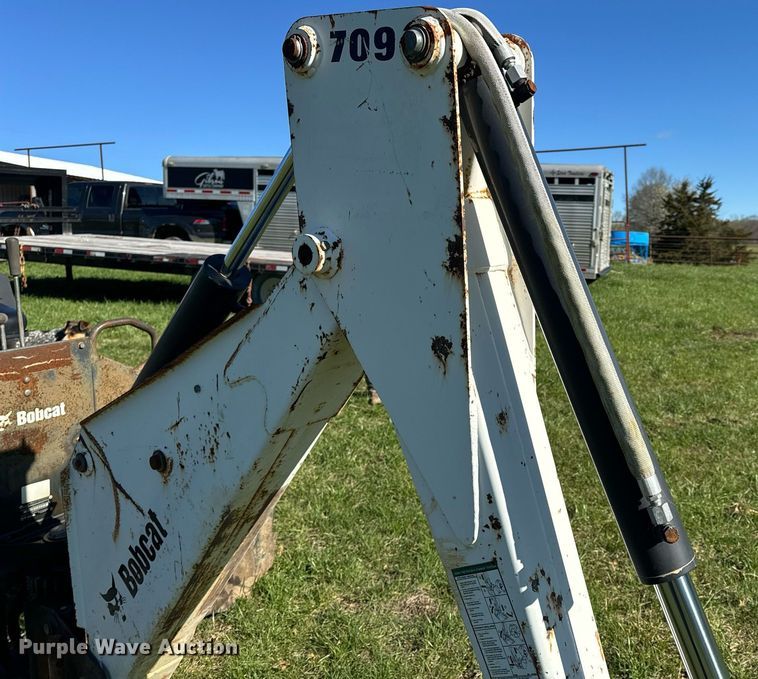 image for item EH6649 Bobcat 709FDS skid steer backhoe