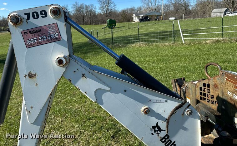 image for item EH6649 Bobcat 709FDS skid steer backhoe