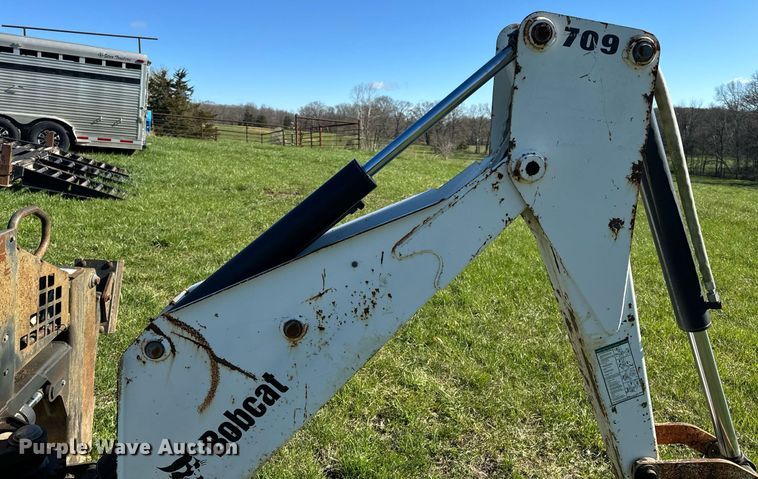 image for item EH6649 Bobcat 709FDS skid steer backhoe