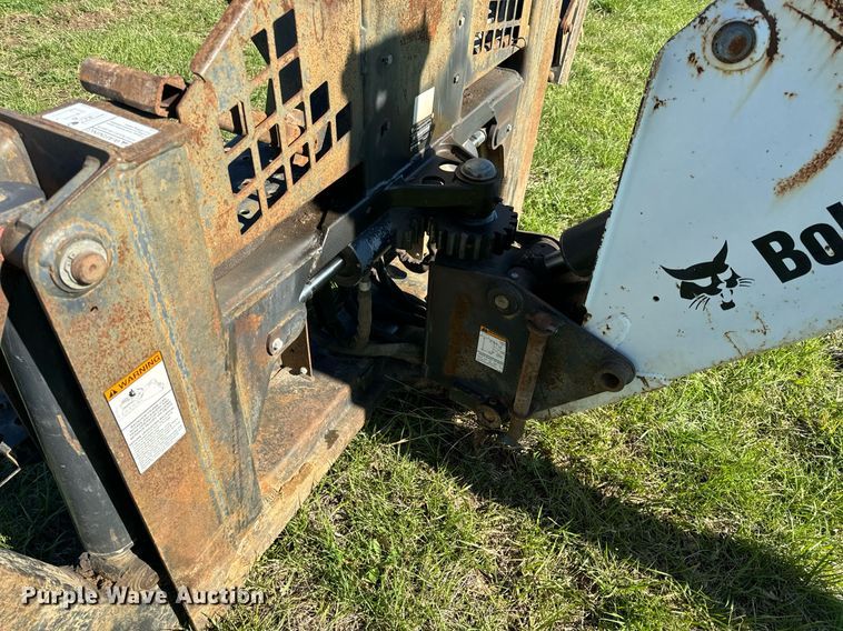image for item EH6649 Bobcat 709FDS skid steer backhoe