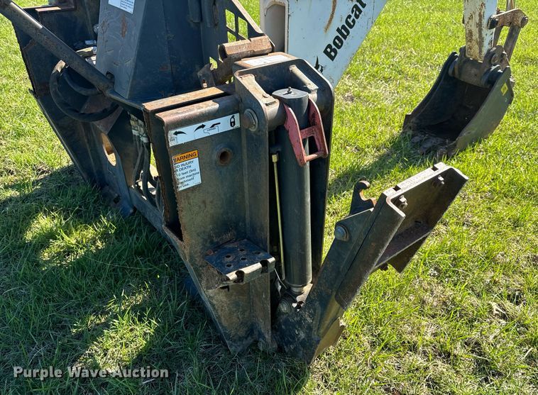 image for item EH6649 Bobcat 709FDS skid steer backhoe