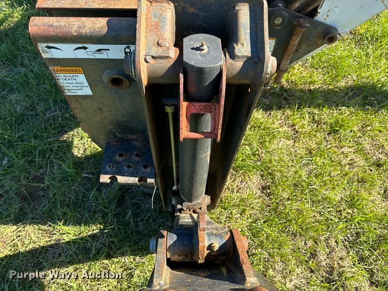 image for item EH6649 Bobcat 709FDS skid steer backhoe