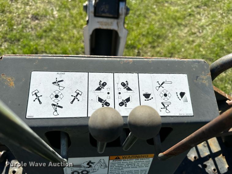 image for item EH6649 Bobcat 709FDS skid steer backhoe