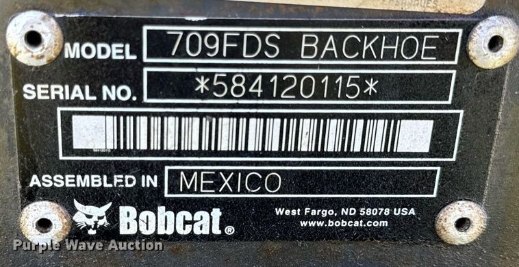 image for item EH6649 Bobcat 709FDS skid steer backhoe