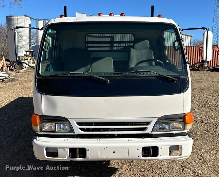 image for item NJ9494 1999 Isuzu NPR flatbed truck