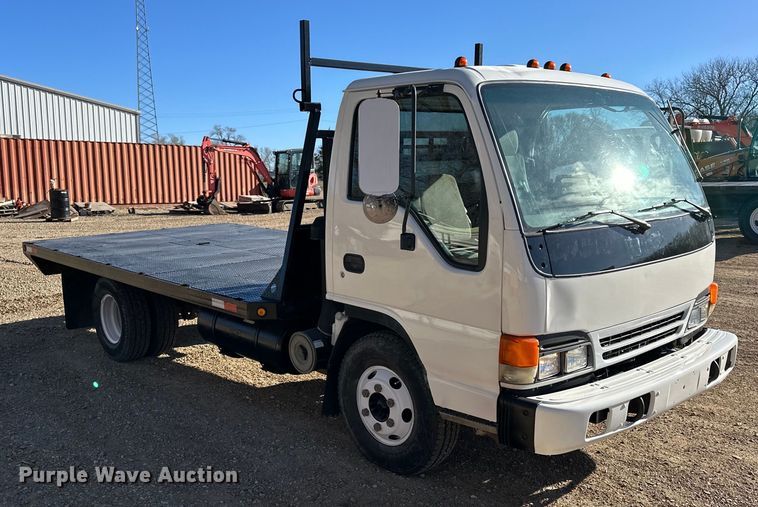 image for item NJ9494 1999 Isuzu NPR flatbed truck