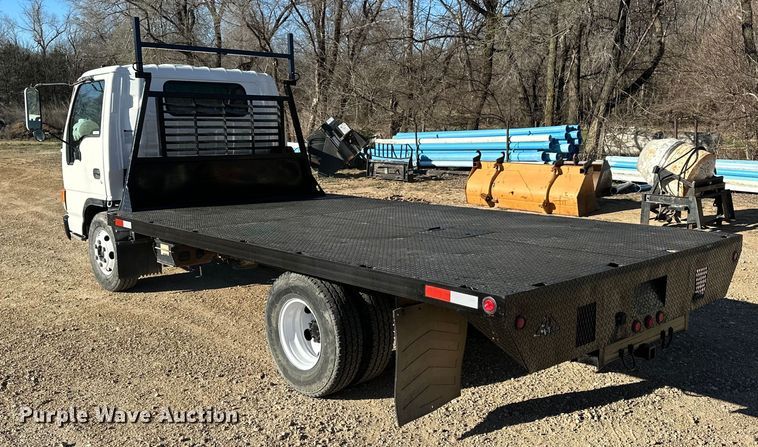 image for item NJ9494 1999 Isuzu NPR flatbed truck