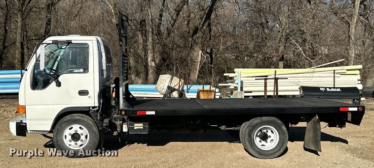 image for item NJ9494 1999 Isuzu NPR flatbed truck