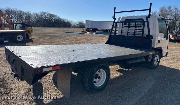 image for item NJ9494 1999 Isuzu NPR flatbed truck